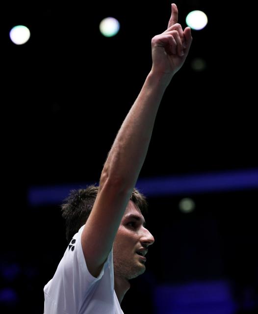 (261023) -- PARIS, Oct. 23, 2026 (Xinhua) -- Christo Popov of France celebrates after the men's singles 1/8 final match between Christo Popov of France and Rasmus Gemke of Denmark at the French Open badminton tournament in Paris, France, Oct. 22, 2026. (Xinhua/Wu Huiwo)