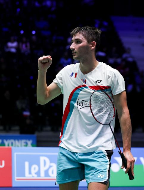 (261023) -- PARIS, Oct. 23, 2026 (Xinhua) -- Christo Popov of France reacts during the men's singles 1/8 final match between Christo Popov of France and Rasmus Gemke of Denmark at the French Open badminton tournament in Paris, France, Oct. 22, 2026. (Xinhua/Wu Huiwo)