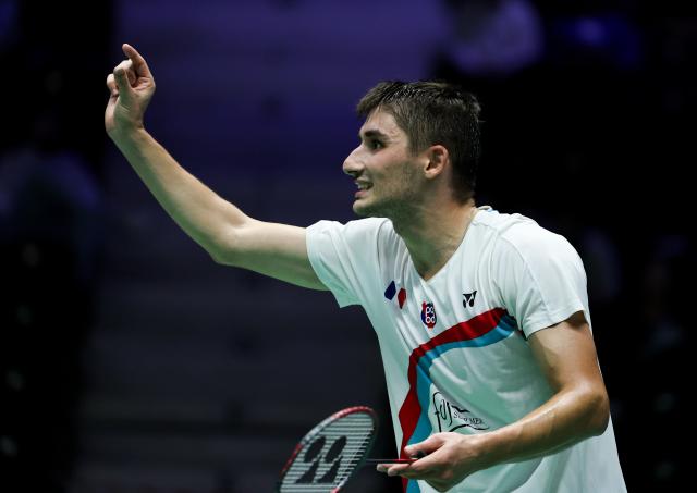(261023) -- PARIS, Oct. 23, 2026 (Xinhua) -- Christo Popov of France reacts during the men's singles 1/8 final match between Christo Popov of France and Rasmus Gemke of Denmark at the French Open badminton tournament in Paris, France, Oct. 22, 2026. (Xinhua/Wu Huiwo)