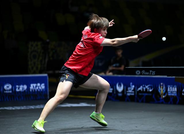 (261023) -- TASHKENT, Oct. 23, 2026 (Xinhua) -- Wang Yidi of China hits a return against Harimoto Miwa of Japan during the women's teams final between China and Japan at the 29th ITTF-Asian Table Tennis Championships in Tashkent, Uzbekistan, Oct. 22, 2026. (Xinhua/Feng Kaihua)
