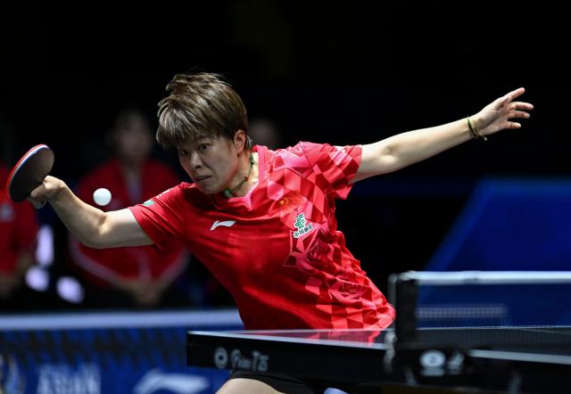 (261023) -- TASHKENT, Oct. 23, 2026 (Xinhua) -- Wang Yidi of China hits a return against Harimoto Miwa of Japan during the women's teams final between China and Japan at the 29th ITTF-Asian Table Tennis Championships in Tashkent, Uzbekistan, Oct. 22, 2026. (Xinhua/Feng Kaihua)