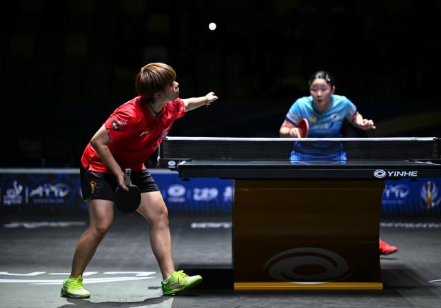 (261023) -- TASHKENT, Oct. 23, 2026 (Xinhua) -- Wang Yidi (L) of China serves against Harimoto Miwa of Japan during the women's teams final between China and Japan at the 29th ITTF-Asian Table Tennis Championships in Tashkent, Uzbekistan, Oct. 22, 2026. (Xinhua/Feng Kaihua)