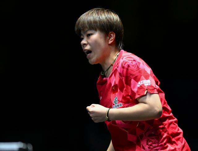 (261023) -- TASHKENT, Oct. 23, 2026 (Xinhua) -- Wang Yidi of China reacts against Harimoto Miwa of Japan during the women's teams final between China and Japan at the 29th ITTF-Asian Table Tennis Championships in Tashkent, Uzbekistan, Oct. 22, 2026. (Xinhua/Feng Kaihua)