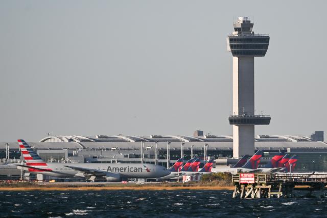 (261023) -- NEW YORK, Oct. 23, 2026 (Xinhua) -- An American Airlines aircraft taxis on a runway at John F. Kennedy International Airport (JFK) in New York City, the United States, Oct. 22, 2026. As major U.S. airlines reported their third-quarter (Q3) operating results, rising fuel costs put pressure on their profit margins despite strong travel demand.
   TO GO WITH "High fuel costs squeeze major U.S. airlines' profits despite strong revenues" (Photo by Ziyu Julian Zhu/Xinhua)