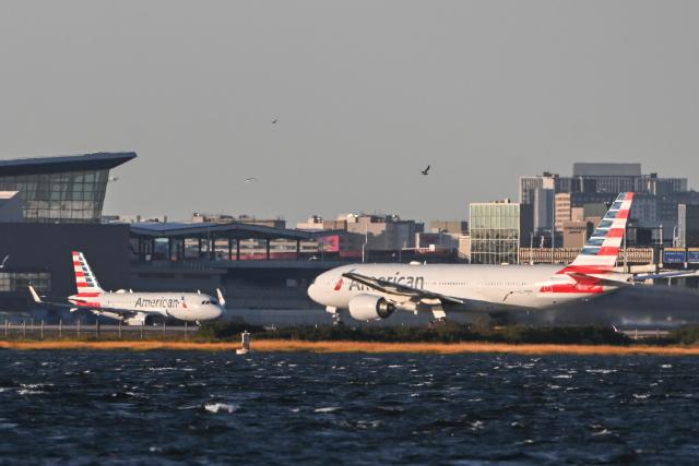 (261023) -- NEW YORK, Oct. 23, 2026 (Xinhua) -- American Airlines aircrafts are seen at John F. Kennedy International Airport (JFK) in New York City, the United States, Oct. 22, 2026. As major U.S. airlines reported their third-quarter (Q3) operating results, rising fuel costs put pressure on their profit margins despite strong travel demand.
   TO GO WITH "High fuel costs squeeze major U.S. airlines' profits despite strong revenues" (Photo by Ziyu Julian Zhu/Xinhua)
