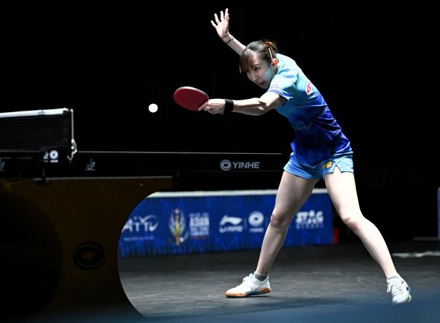 (261023) -- TASHKENT, Oct. 23, 2026 (Xinhua) -- Hayata Hina of Japan hits a return against Kuai Man of China during the women's teams final between China and Japan at the 29th ITTF-Asian Table Tennis Championships in Tashkent, Uzbekistan, Oct. 22, 2026. (Xinhua/Feng Kaihua)