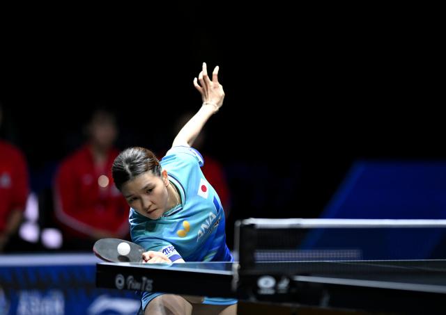 (261023) -- TASHKENT, Oct. 23, 2026 (Xinhua) -- Hashimoto Honoka of Japan hits a return against Wang Yidi of China during the women's teams final between China and Japan at the 29th ITTF-Asian Table Tennis Championships in Tashkent, Uzbekistan, Oct. 22, 2026. (Xinhua/Feng Kaihua)