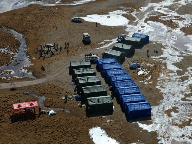 (261023) -- LHASA, Oct. 23, 2026 (Xinhua) -- An aerial drone photo taken on Oct. 23, 2026 shows a temporary shelter at an earthquake-hit village in Maru Township of Baqen County, Nagqu City, southwest China's Xizang Autonomous Region. Sixteen people were killed and 65 others injured after a 7.0-magnitude earthquake struck Baqen County of Nagqu City in southwest China's Xizang Autonomous Region at 10:33 p.m. Thursday, the city's earthquake relief headquarters said on Friday.
   The Ministry of Emergency Management and authorities in Xizang have mobilized resources for rescue and relief operations. (Xinhua/Purbu Tsering)