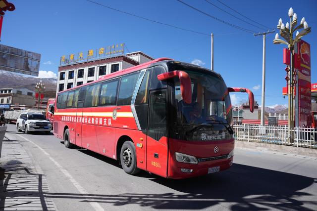 (261023) -- LHASA, Oct. 23, 2026 (Xinhua) -- This photo taken on Oct. 23, 2026 shows a rescue vehicle dispatched by local fire-fighting and rescue authorities for the earthquake-hit Baqen County of Nagqu City in southwest China's Xizang Autonomous Region. Sixteen people were killed and 65 others injured after a 7.0-magnitude earthquake struck Baqen County of Nagqu City in southwest China's Xizang Autonomous Region at 10:33 p.m. Thursday, the city's earthquake relief headquarters said on Friday.
   The Ministry of Emergency Management and authorities in Xizang have mobilized resources for rescue and relief operations. (Xinhua/Tenzin Nyida)
