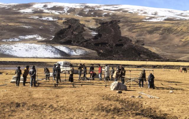 (261023) -- LHASA, Oct. 23, 2026 (Xinhua) -- People set up tents at an earthquake-hit village in Maru Township of Baqen County, Nagqu City, southwest China's Xizang Autonomous Region, Oct. 23, 2026. Sixteen people were killed and 65 others injured after a 7.0-magnitude earthquake struck Baqen County of Nagqu City in southwest China's Xizang Autonomous Region at 10:33 p.m. Thursday, the city's earthquake relief headquarters said on Friday.
   The Ministry of Emergency Management and authorities in Xizang have mobilized resources for rescue and relief operations. (Xinhua/Zhai Yongguan)