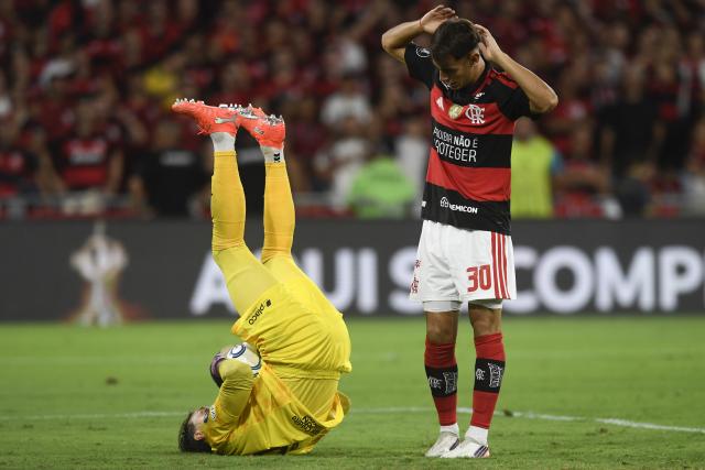 (261023) -- RIO DE JANEIRO, Oct. 23, 2026 (Xinhua) -- Goalkeeper Fernando Muslera (L) of Estudiantes de La Plata makes a save during the second leg of the Copa Libertadores semifinal football match between Brazil's Flamengo and Argentina's Estudiantes de La Plata at the Maracana stadium in Rio de Janeiro, Brazil, Oct. 22, 2026. (Photo by Daniel Ramalho/Xinhua)