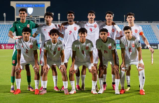 (261023) -- DOHA, Oct. 23, 2026 (Xinhua) -- Starting players of Bahrain pose for a group photo before the Gulf Football Federation (GFF) Gulf Cup U-17 Qatar 2026 football match between China and Bahrain in Doha, Qatar, Oct. 22, 2026. (Photo by Nikku/Xinhua)