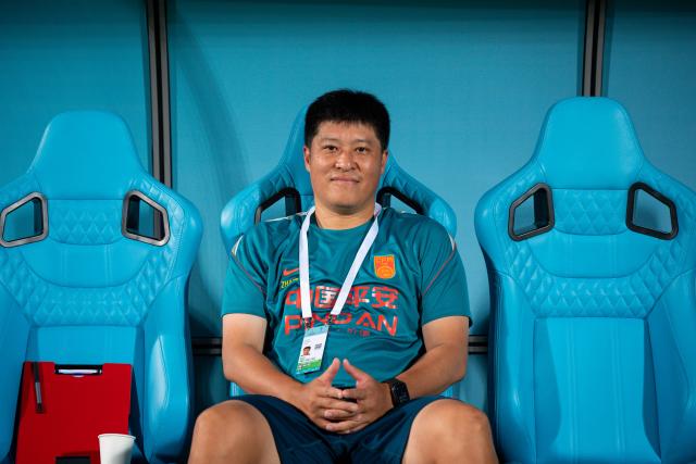 (261023) -- DOHA, Oct. 23, 2026 (Xinhua) -- China's head coach Zhang Yaokun looks on before the Gulf Football Federation (GFF) Gulf Cup U-17 Qatar 2026 football match between China and Bahrain in Doha, Qatar, Oct. 22, 2026. (Photo by Nikku/Xinhua)