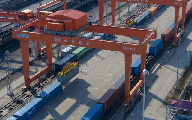 (261023) -- HARBIN, Oct. 23, 2026 (Xinhua) -- A drone photo taken on Oct. 23, 2026 shows transshipment operations at the transshipment yard at Tongjiang North Railway Station in Tongjiang, northeast China's Heilongjiang Province. According to China Railway Harbin Group, a total of 6,024 China-Europe freight train trips have been made via the eastern corridor of the China-Europe freight train service so far this year, up 40.3 percent year on year. (Photo by Wu Yunan/Xinhua)