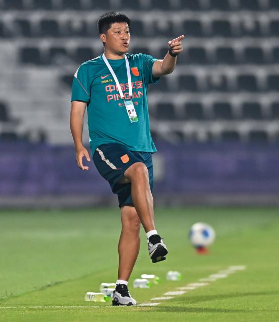 (261023) -- DOHA, Oct. 23, 2026 (Xinhua) -- China's head coach Zhang Yaokun reacts during the Gulf Football Federation (GFF) Gulf Cup U-17 Qatar 2026 football match between China and Bahrain in Doha, Qatar, Oct. 22, 2026. (Photo by Nikku/Xinhua)