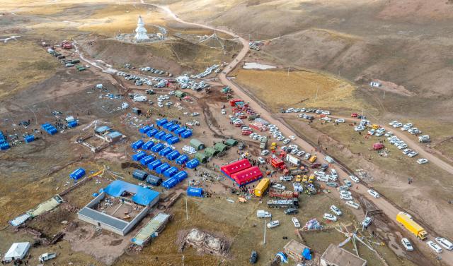 (261023) -- LHASA, Oct. 23, 2026 (Xinhua) -- An aerial drone photo taken on Oct. 23, 2026 shows emergency tents at an earthquake-hit village in Maru Township of Baqen County, Nagqu City, southwest China's Xizang Autonomous Region. Sixteen people have been killed and 76 others are injured following a 7.0-magnitude earthquake which struck Baqen County of the city of Nagqu in southwest China's Xizang Autonomous Region at 10:33 p.m. on Thursday, local authorities said.
   The Ministry of Emergency Management and authorities in Xizang have mobilized resources for rescue and relief operations. (Xinhua/Tenzin Nyida)