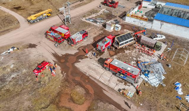 (261023) -- LHASA, Oct. 23, 2026 (Xinhua) -- An aerial drone photo taken on Oct. 23, 2026 shows emergency forces arriving at an earthquake-hit village in Maru Township of Baqen County, Nagqu City, southwest China's Xizang Autonomous Region. Sixteen people have been killed and 76 others are injured following a 7.0-magnitude earthquake which struck Baqen County of the city of Nagqu in southwest China's Xizang Autonomous Region at 10:33 p.m. on Thursday, local authorities said.
   The Ministry of Emergency Management and authorities in Xizang have mobilized resources for rescue and relief operations. (Xinhua/Tenzin Nyida)