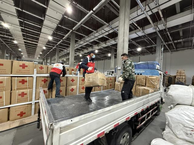 (261023) -- LHASA, Oct. 23, 2026 (Xinhua) -- Staff members transfer relief supplies in Lhasa, southwest China's Xizang Autonomous Region, Oct. 23, 2026. A 7.0-magnitude earthquake struck Baqen County of Nagqu City in southwest China's Xizang Autonomous Region, at 10:33 p.m. Thursday (Beijing Time), according to the China Earthquake Networks Center (CENC).
   The Red Cross Society of China has dispatched a working team to the disaster-hit area to guide local relief efforts. It has also allocated 3,800 sets of supplies, including family relief kits, hygiene kits, heaters, tents, jackets, folding beds and quilts. (Xinhua)