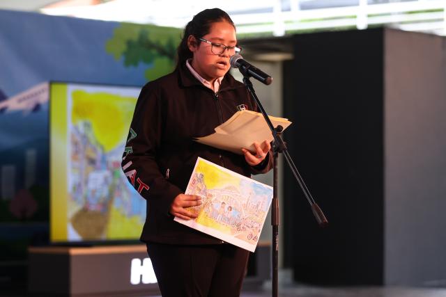 (261023) -- MEXICO CITY, Oct. 23, 2026 (Xinhua) -- A winner speaks at the award ceremony of the 13th "China Through My Eyes" Youth Painting Competition in Mexico City, Mexico, Oct. 22, 2026. The competition was held here on Thursday, attracting nearly 200 young participants from several Mexican states. (Photo by Francisco Canedo/Xinhua)