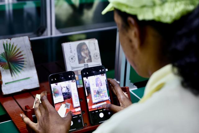(261023) -- NAIROBI, Oct. 23, 2026 (Xinhua) -- A worker is busy at a smartphone production line of a Tecno factory in Addis Ababa, Ethiopia, Oct. 13, 2026. TO GO WITH "Feature: Chinese smartphones help narrow digital divide in Africa" (Xinhua/Geng Xinning)
