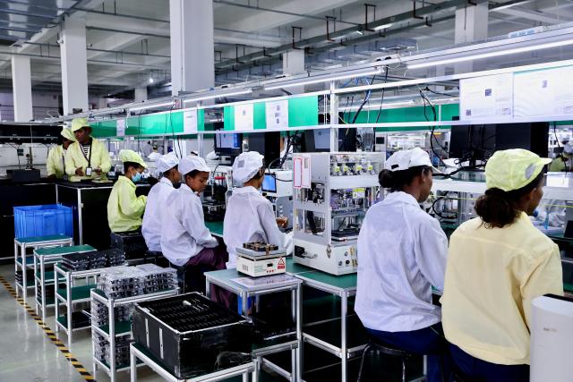 (261023) -- NAIROBI, Oct. 23, 2026 (Xinhua) -- Workers are busy at a smartphone production line of a Tecno factory in Addis Ababa, Ethiopia, Oct. 13, 2026. TO GO WITH "Feature: Chinese smartphones help narrow digital divide in Africa" (Xinhua/Geng Xinning)