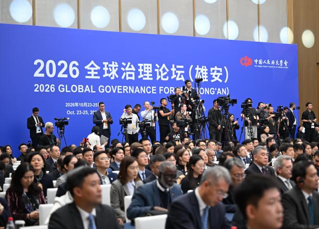 (261023) -- XIONG'AN, Oct. 23, 2026 (Xinhua) -- Media staff work during the opening ceremony of the 2026 Global Governance Forum (Xiong'an) in Xiong'an New Area, north China's Hebei Province, Oct. 23, 2026. The 2026 Global Governance Forum (Xiong'an) kicked off here on Friday.
   Hosted by the Chinese People's Institute of Foreign Affairs, the forum is themed "Rebuilding Confidence and Cooperation: Reforming and Improving Global Governance in a Transforming World." (Xinhua/Mu Yu)