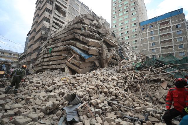 (261023) -- NAIROBI, Oct. 23, 2026 (Xinhua) -- This photo taken on Oct. 23, 2026 shows the site of a building collapse accident in Eastleigh, Nairobi, Kenya. Several people are feared trapped after an 18-story building under construction collapsed Friday afternoon in Eastleigh, a high-density commercial and residential suburb of Nairobi, the Kenyan capital. (Photo by Henry Naminde/Xinhua)
