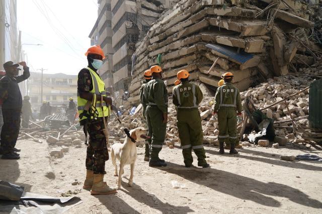 (261023) -- NAIROBI, Oct. 23, 2026 (Xinhua) -- Rescuers work at the site of a building collapse accident in Eastleigh, Nairobi, Kenya, Oct. 23, 2026. Several people are feared trapped after an 18-story building under construction collapsed Friday afternoon in Eastleigh, a high-density commercial and residential suburb of Nairobi, the Kenyan capital. (Xinhua/Xie Jianfei)