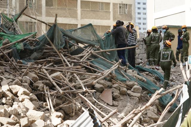(261023) -- NAIROBI, Oct. 23, 2026 (Xinhua) -- Rescuers work at the site of a building collapse accident in Eastleigh, Nairobi, Kenya, Oct. 23, 2026. Several people are feared trapped after an 18-story building under construction collapsed Friday afternoon in Eastleigh, a high-density commercial and residential suburb of Nairobi, the Kenyan capital. (Xinhua/Xie Jianfei)