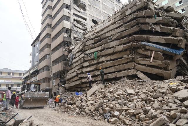 (261023) -- NAIROBI, Oct. 23, 2026 (Xinhua) -- Rescuers work at the site of a building collapse accident in Eastleigh, Nairobi, Kenya, Oct. 23, 2026. Several people are feared trapped after an 18-story building under construction collapsed Friday afternoon in Eastleigh, a high-density commercial and residential suburb of Nairobi, the Kenyan capital. (Xinhua/Xie Jianfei)