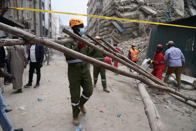 (261023) -- NAIROBI, Oct. 23, 2026 (Xinhua) -- Rescuers work at the site of a building collapse accident in Eastleigh, Nairobi, Kenya, Oct. 23, 2026. Several people are feared trapped after an 18-story building under construction collapsed Friday afternoon in Eastleigh, a high-density commercial and residential suburb of Nairobi, the Kenyan capital. (Xinhua/Xie Jianfei)