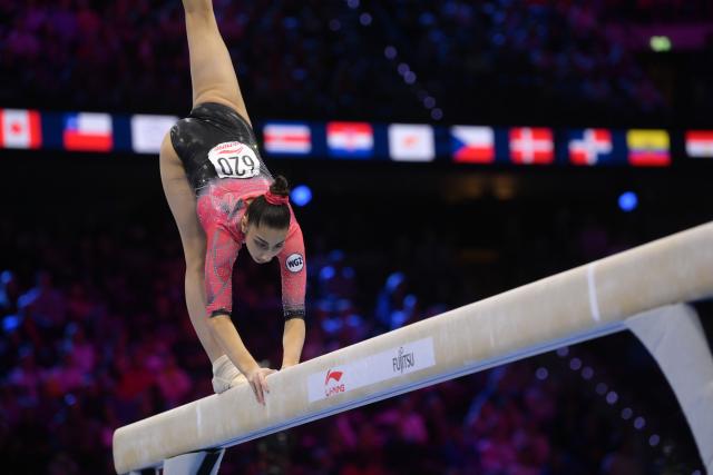 (261024) -- ROTTERDAM, Oct. 24, 2026 (Xinhua) -- World Gymnastics 2 athlete Liudmila Roshchina from Russia competes during the balance beam event of the women's all around final at the Artistic Gymnastics World Championships 2026 in Rotterdam, the Netherlands, Oct. 23, 2026. (Xinhua/Weng Xinyang)