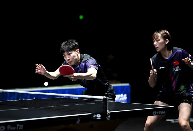 (261024) -- TASHKENT, Oct. 24, 2026 (Xinhua) -- Huang Youzheng (L)/Chen Yi of China compete during the mixed doubles final against Matsushima Sora/Harimoto Miwa of Japan at the 29th ITTF-Asian Table Tennis Championships in Tashkent, Uzbekistan, Oct. 23, 2026. (Xinhua/Feng Kaihua)