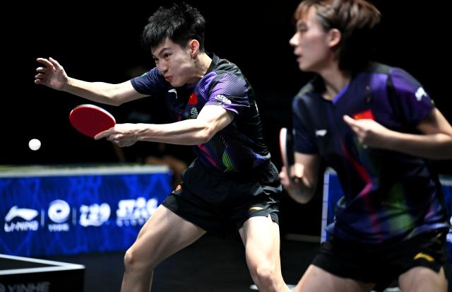 (261024) -- TASHKENT, Oct. 24, 2026 (Xinhua) -- Huang Youzheng (L)/Chen Yi of China compete during the mixed doubles final against Matsushima Sora/Harimoto Miwa of Japan at the 29th ITTF-Asian Table Tennis Championships in Tashkent, Uzbekistan, Oct. 23, 2026. (Xinhua/Feng Kaihua)