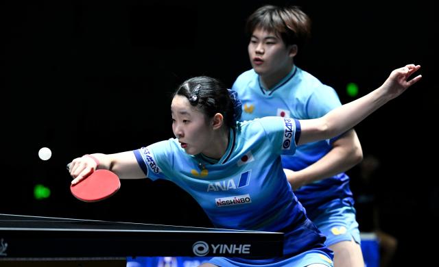 (261024) -- TASHKENT, Oct. 24, 2026 (Xinhua) -- Matsushima Sora/Harimoto Miwa (L) of Japan compete during the mixed doubles final against Huang Youzheng/Chen Yi of China at the 29th ITTF-Asian Table Tennis Championships in Tashkent, Uzbekistan, Oct. 23, 2026. (Xinhua/Feng Kaihua)