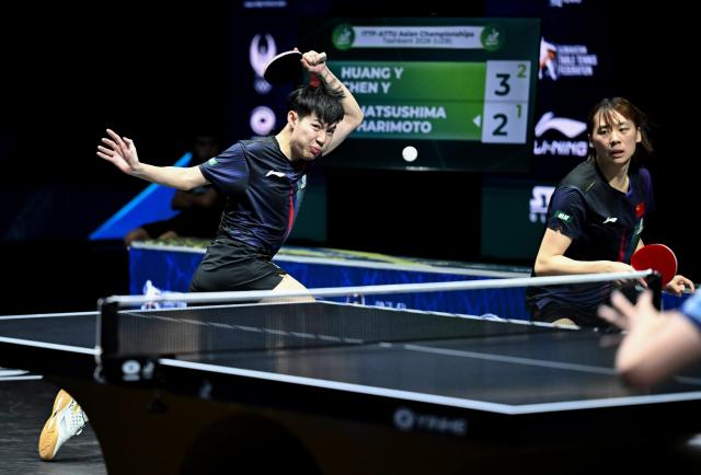 (261024) -- TASHKENT, Oct. 24, 2026 (Xinhua) -- Huang Youzheng (L)/Chen Yi of China compete during the mixed doubles final against Matsushima Sora/Harimoto Miwa of Japan at the 29th ITTF-Asian Table Tennis Championships in Tashkent, Uzbekistan, Oct. 23, 2026. (Xinhua/Feng Kaihua)