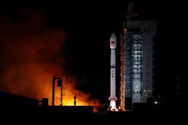 (261024) -- JIUQUAN, Oct. 24, 2026 (Xinhua) -- A Long March-4B carrier rocket carrying two groups of remote sensing satellites blasts off from the Jiuquan Satellite Launch Center in northwest China, Oct. 24, 2026. The satellites 07-09 of the Yaogan-53 group and the satellites 19-21 of the Yaogan-56 group were launched at 3:25 a.m. (Beijing Time) aboard a Long March-4B carrier rocket, and they entered the preset orbits successfully. (Photo by Wang Jiangbo/Xinhua)