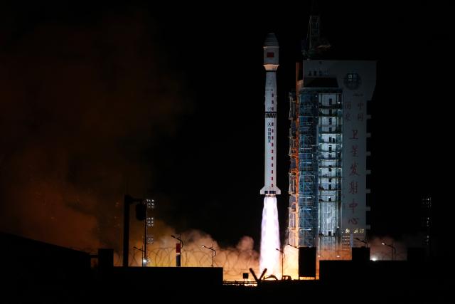 (261024) -- JIUQUAN, Oct. 24, 2026 (Xinhua) -- A Long March-4B carrier rocket carrying two groups of remote sensing satellites blasts off from the Jiuquan Satellite Launch Center in northwest China, Oct. 24, 2026. The satellites 07-09 of the Yaogan-53 group and the satellites 19-21 of the Yaogan-56 group were launched at 3:25 a.m. (Beijing Time) aboard a Long March-4B carrier rocket, and they entered the preset orbits successfully. (Photo by Wang Jiangbo/Xinhua)