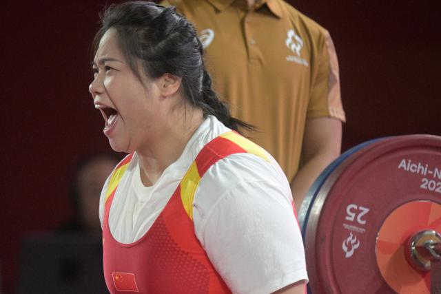 (261024) -- NAGOYA, Oct. 24, 2026 (Xinhua) -- Tan Yujiao of China reacts during the mixed team heats of Para Powerlifting at the Aichi-Nagoya Asian Para Games in Nagoya, Japan, Oct. 24, 2026. (Xinhua/Then Chih Wey)