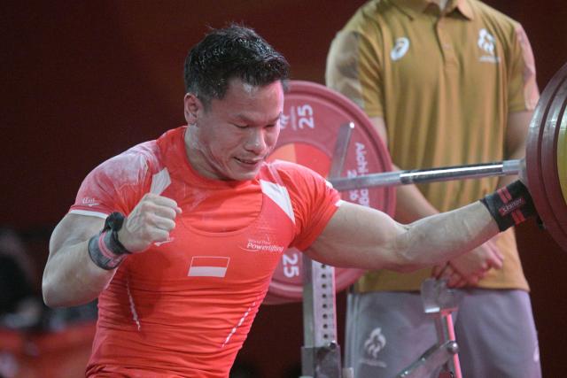 (261024) -- NAGOYA, Oct. 24, 2026 (Xinhua) -- A Hadi of Indonesia competes during the mixed team heats of Para Powerlifting at the Aichi-Nagoya Asian Para Games in Nagoya, Japan, Oct. 24, 2026. (Xinhua/Then Chih Wey)