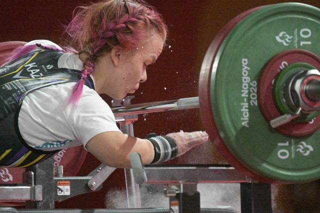 (261024) -- NAGOYA, Oct. 24, 2026 (Xinhua) -- Alina Solodukhina of Kazakhstan competes during the mixed team heats of Para Powerlifting at the Aichi-Nagoya Asian Para Games in Nagoya, Japan, Oct. 24, 2026. (Xinhua/Then Chih Wey)