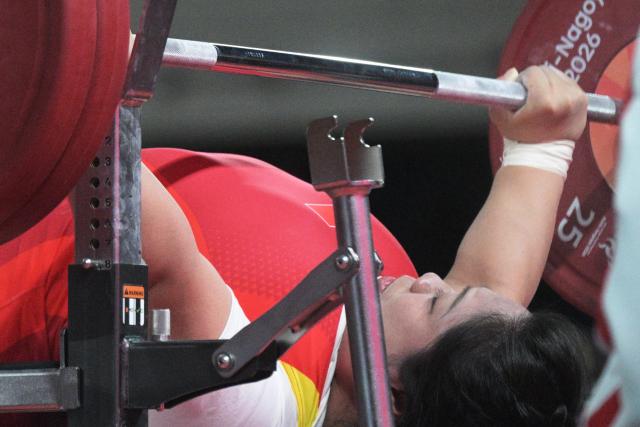 (261024) -- NAGOYA, Oct. 24, 2026 (Xinhua) -- Tan Yujiao of China competes during the mixed team bronze medal match between China and Uzbekistan of Para Powerlifting at the Aichi-Nagoya Asian Para Games in Nagoya, Japan, Oct. 24, 2026. (Xinhua/Then Chih Wey)