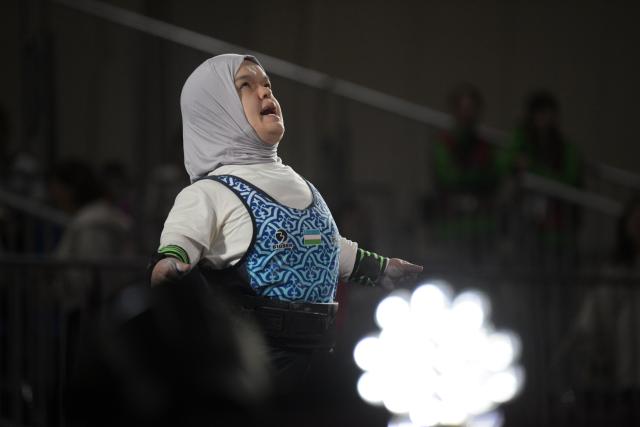 (261024) -- NAGOYA, Oct. 24, 2026 (Xinhua) -- Nasiba Tashpulatova of Uzbekistan reacts during the mixed team bronze medal match between China and Uzbekistan of Para Powerlifting at the Aichi-Nagoya Asian Para Games in Nagoya, Japan, Oct. 24, 2026. (Xinhua/Then Chih Wey)