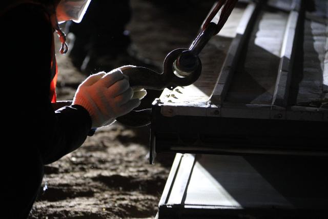 (261024) -- NAGQU, Oct. 24, 2026 (Xinhua) -- A worker of China Railway Group Limited builds a prefabricated house at a quake-hit village in Maru Township of Baqen County, Nagqu City, southwest China's Xizang Autonomous Region, Oct. 24, 2026.
  The first batch of prefabricated houses has been set up on Saturday for the affected residents in a village of Maru Township, one of the hardest-hit areas near the epicenter, following a 7.0-magnitude earthquake that struck Baqen County of the city of Nagqu in southwest China's Xizang Autonomous Region at 10:33 p.m. on Thursday. (Photo by Chen Xiaojun/Xinhua)