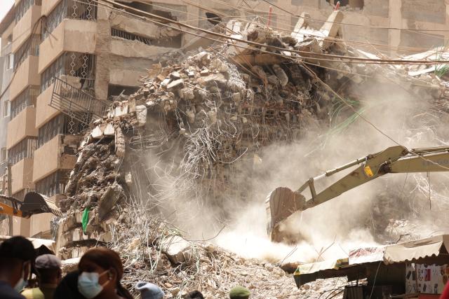 (261024) -- NAIROBI, Oct. 24, 2026 (Xinhua) -- Rescuers work at the site of a building collapse in Eastleigh, Nairobi, Kenya, Oct. 24, 2026. Kenyan authorities on Saturday continued to search for seven people still missing after a multi-story building collapsed in a suburb of Nairobi on Friday. (Photo by John Okoyo/Xinhua)