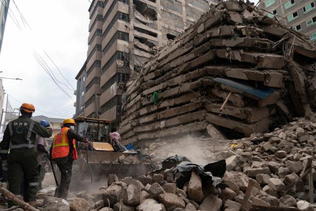 (261024) -- NAIROBI, Oct. 24, 2026 (Xinhua) -- Rescuers work at the site of a building collapse in Eastleigh, Nairobi, Kenya, Oct. 23, 2026. Kenyan authorities on Saturday continued to search for seven people still missing after a multi-story building collapsed in a suburb of Nairobi on Friday. (Xinhua/Xie Jianfei)