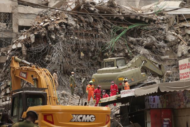 (261024) -- NAIROBI, Oct. 24, 2026 (Xinhua) -- Rescuers work at the site of a building collapse in Eastleigh, Nairobi, Kenya, Oct. 24, 2026. Kenyan authorities on Saturday continued to search for seven people still missing after a multi-story building collapsed in a suburb of Nairobi on Friday. (Photo by John Okoyo/Xinhua)