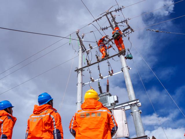 (261024) -- NAGQU, Oct. 24, 2026 (Xinhua) -- Power workers operate to ensure power supply at a quake-hit village in Maru Township of Baqen County, Nagqu City, southwest China's Xizang Autonomous Region, Oct. 24, 2026. As of 11 a.m. Saturday, 52,450 items or sets of disaster relief supplies had been sent to the quake zone, while more than 2,500 rescue personnel were engaged in relief operations.
   Authorities have established 35 temporary resettlement sites in the disaster zone. Medical treatment and public health and epidemic prevention efforts are proceeding in an orderly manner, according to the local emergency command headquarters. (Xinhua/Tenzin Nyida)