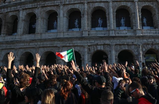(261024) -- ROME, Oct. 24, 2026 (Xinhua) -- Demonstrators march past the Colosseum during an anti-war march in Rome, Italy, Oct. 24, 2026. Protests over rising living costs, military expansion and increased arms spending swept across several Italian cities on Saturday, with clashes between demonstrators and police reported in multiple locations.
In Rome, demonstrators set off from Piazza della Repubblica, according to the ANSA news agency. Clashes erupted between protesters and police in the city center later in the evening, prompting police to use water cannons and tear gas in an attempt to disperse the crowds. (Xinhua/Wang Kaiyan)