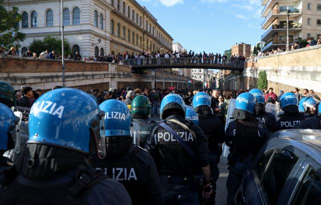 (261024) -- ROME, Oct. 24, 2026 (Xinhua) -- Police block the demonstrators from marching towards the Colosseum during an anti-war march in Rome, Italy, Oct. 24, 2026. Protests over rising living costs, military expansion and increased arms spending swept across several Italian cities on Saturday, with clashes between demonstrators and police reported in multiple locations.
In Rome, demonstrators set off from Piazza della Repubblica, according to the ANSA news agency. Clashes erupted between protesters and police in the city center later in the evening, prompting police to use water cannons and tear gas in an attempt to disperse the crowds. (Xinhua/Wang Kaiyan)
